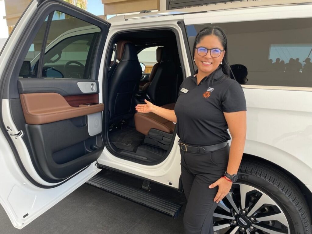 Woman with a transportation van.